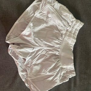 Used White Lululemon Low Rise Hotty-Hot shorts. Size 2, length 2.5
